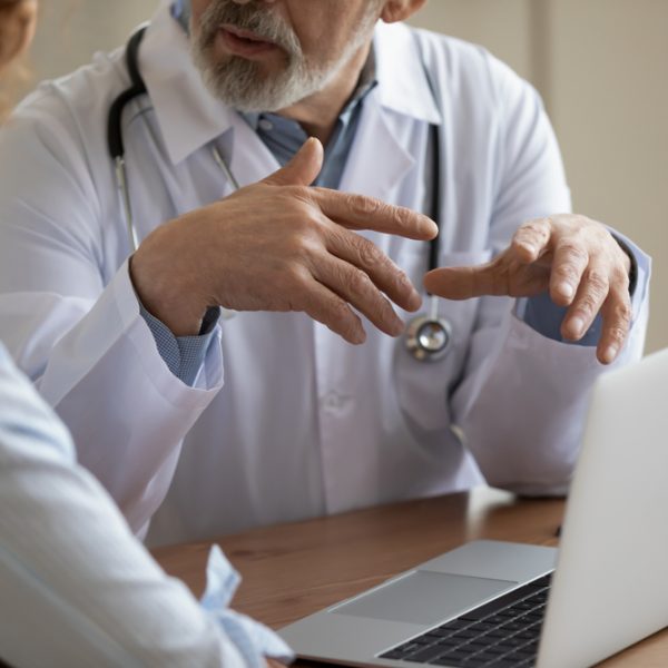 Close,Up,Older,Mature,Male,Doctor,Physician,In,White,Uniform